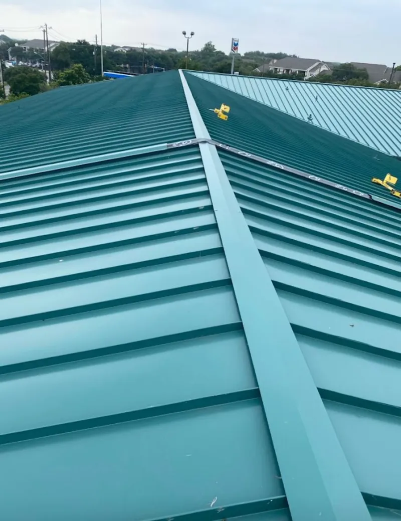 Green commercial metal roof ridge and valley for Metal Roof Repair in Kirkwood