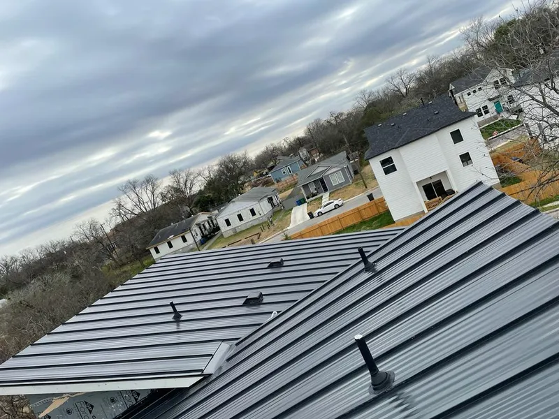 Standing seam metal roof panels with vents for Skylight Repair in Kirkwood